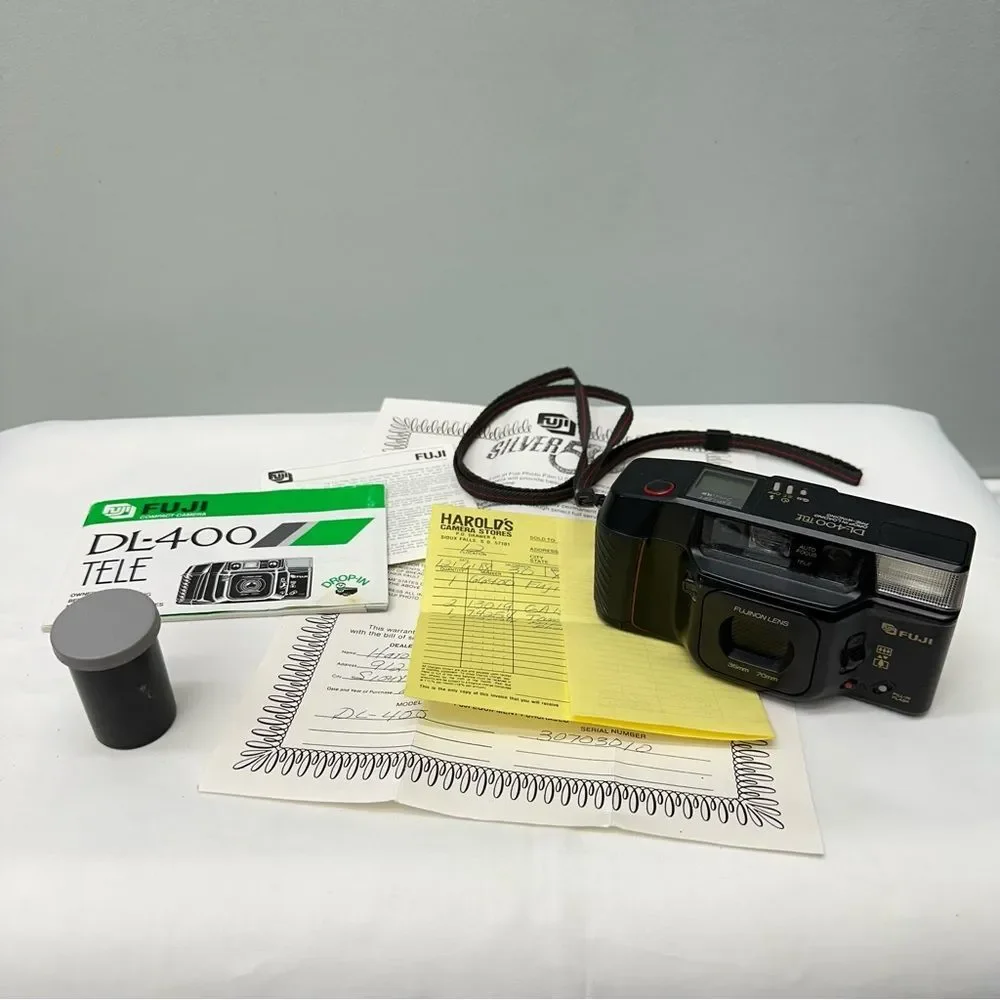 vintage Fuji DL-400 tele 35mm camera. instruction manual, kodak film